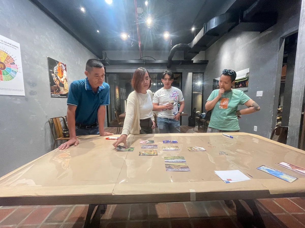 Participants laying out biodiversity cards on the table