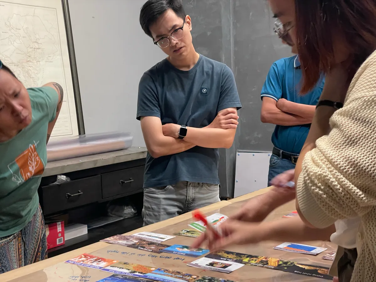Close-up of team discussing biodiversity connections