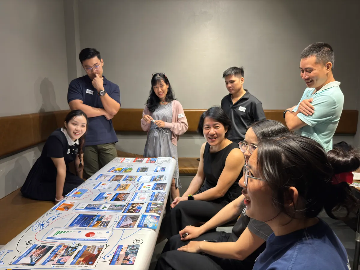 Group engaged in discussion about digital environmental impact