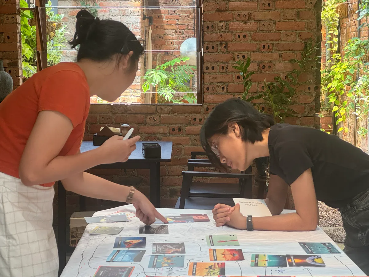 Close-up of participants collaborating on planetary boundaries
